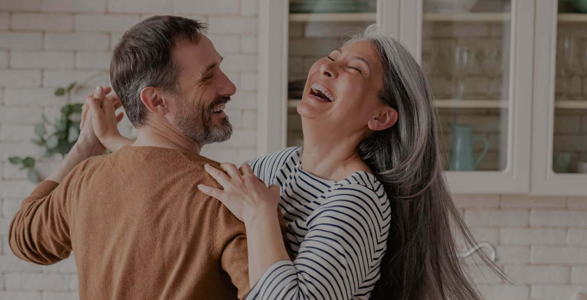 A couple sharing a warm, joyful moment